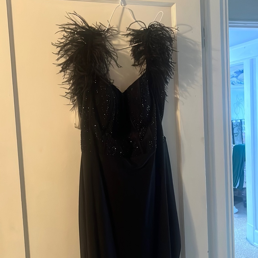 Beautiful Sophia, Thomas prom dress only worn a couple of hours no tears or rips